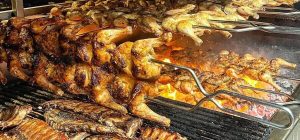 Sagra di Colzè, Festa del Ringraziamento: specialità galletti alla brace e ossi de mascio col cren